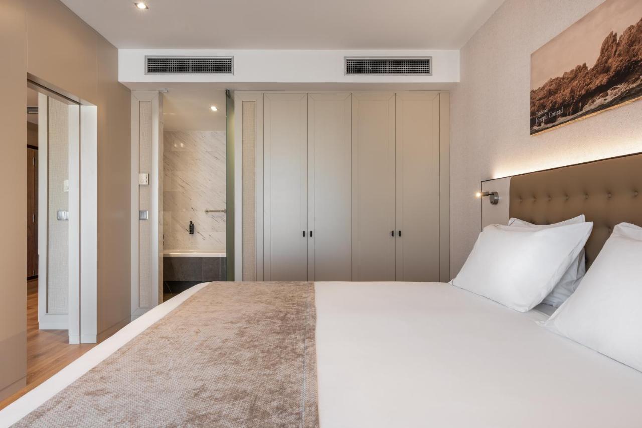 Eurostars Das Letras Lisbon Luaran gambar A bedroom at the hotel